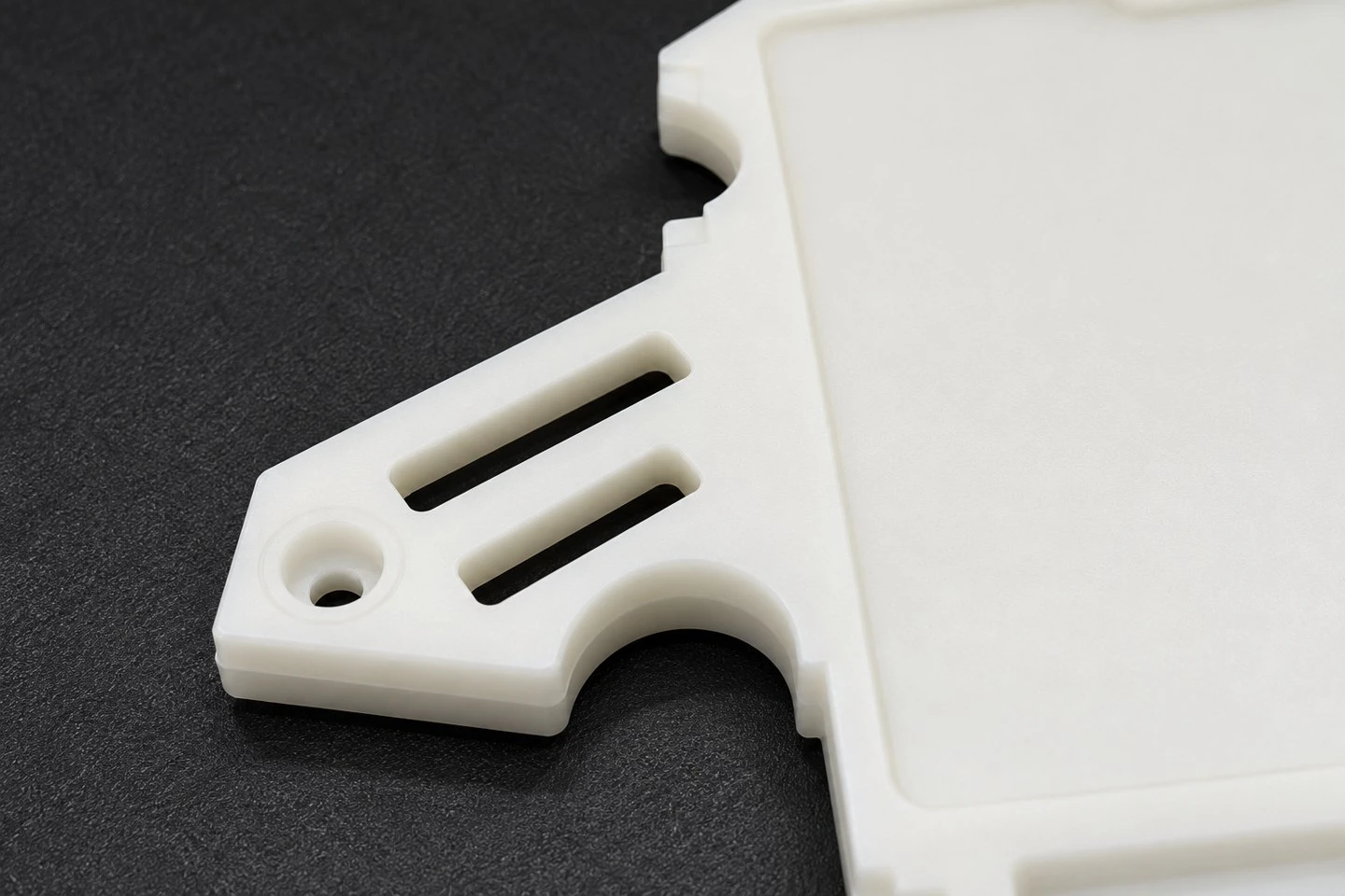 product-1-1 Close view of custom POM mounting plate slots recessed screw hole and stepped edge