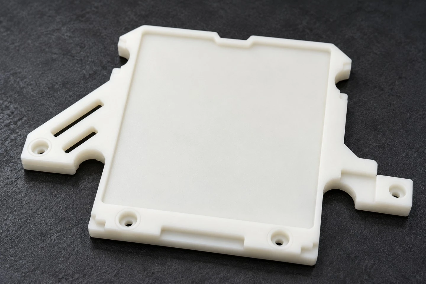 product-1-1 Milky white custom POM mounting plate showing central recess perimeter lip and mounting ears