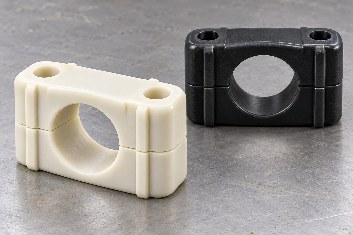 product-1-1 Natural and black custom nylon pipe clamp concepts with matching split bodies and pipe openings