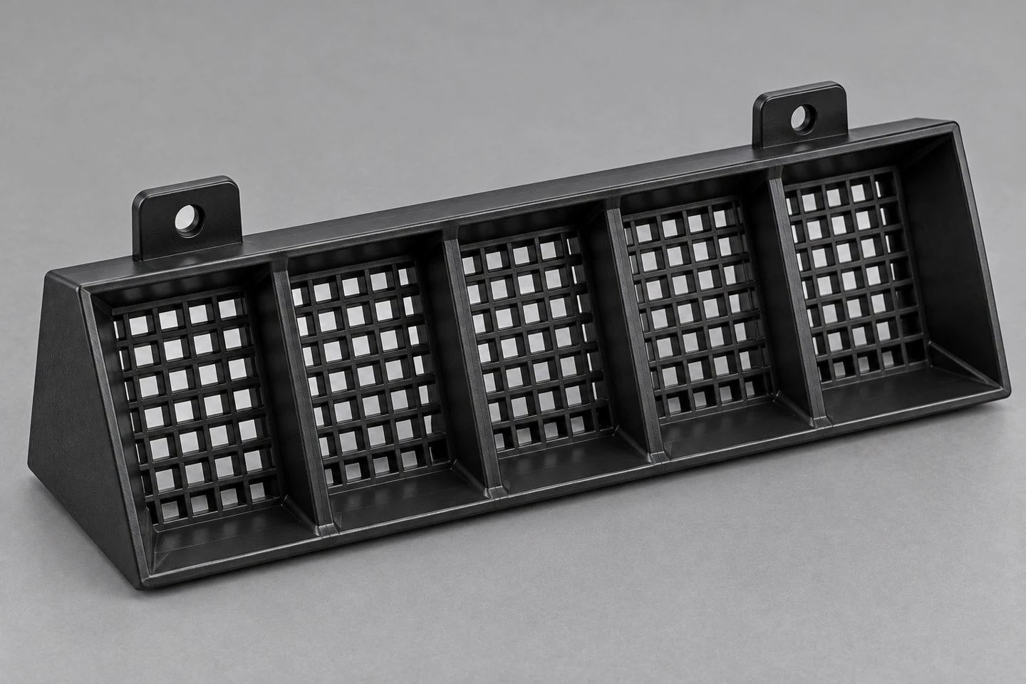 product-1-1 Rear view of a custom plastic vent grille showing the inclined body depth and mounting tab geometry