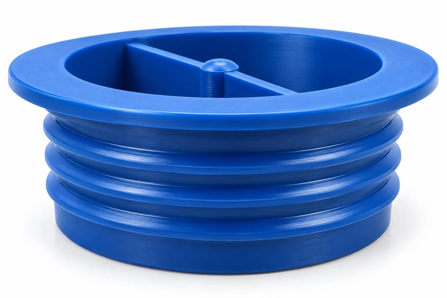 product-1-1 Side profile of raised circumferential features and flange on a blue custom molded protection plug
