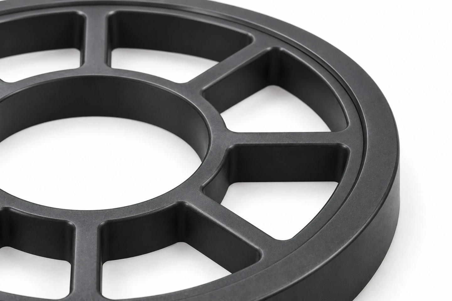 Stepped outer rim and axial depth of a custom polypropylene spoked support ring concept