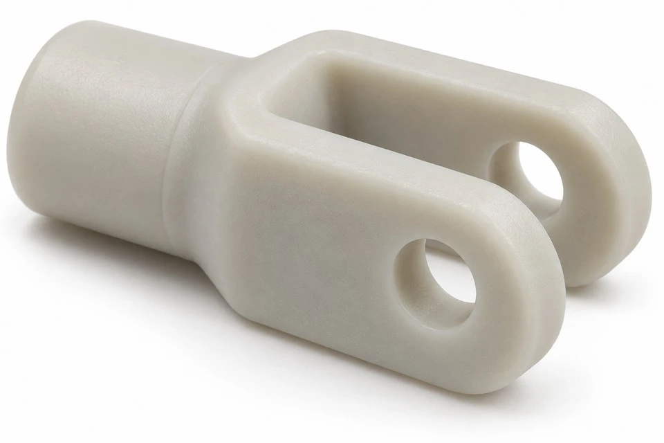 product-1-1 Rounded fork cheeks and transverse pin holes of a custom PA66 nylon clevis